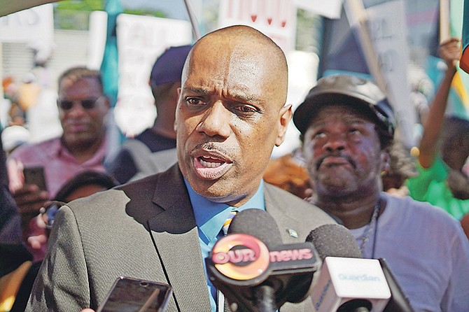 Pineridge MP Rev Frederick McAlpine amongst the Enough is Enough March Protestors. Photo: Terrel W. Carey Sr/Tribune Staff