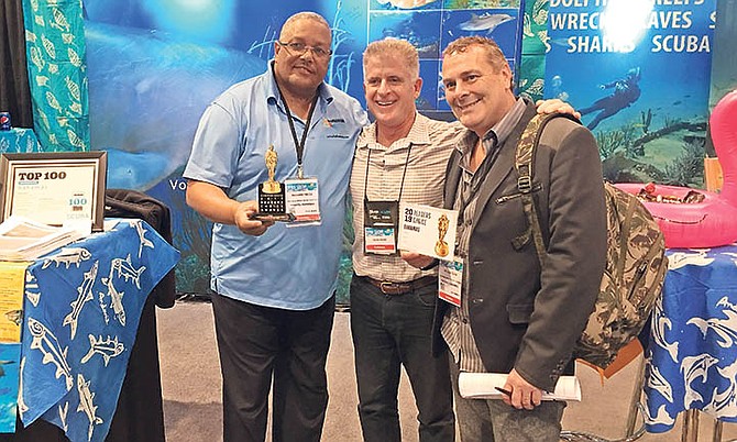 From the left, Richard Treco, Sr. Manager, Vertical Markets, Bahamas Ministry of Tourism and Aviation, David Benz, Managing Editor, Bonnier Corp and Scuba Dive Magazine and William Cline, executive, Bahamas Dive Marketing Committee.