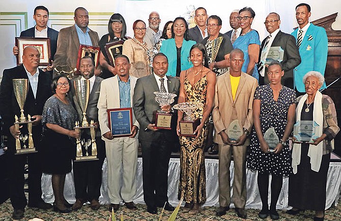ALL the winners of the National Awards are pictured above with Minister of Sports Lanisha Rolle and her officers.