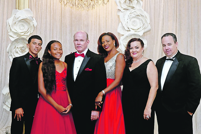 Frederick Albury, third left, with, from left, grandson Isaac Fox, daughter Adiza Anne, wife Daisy, daughter Natasha and son Lionel James.