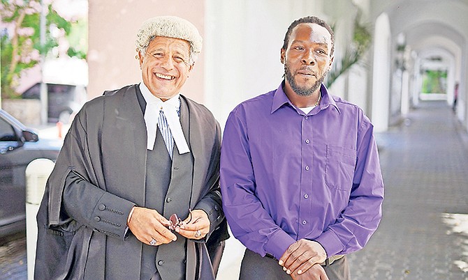 Fred Smith, QC, and Jean Rony Jean-Charles outside the Court of Appeal yesterday. Photo: Terrel W. Carey Sr/Tribune Staff
