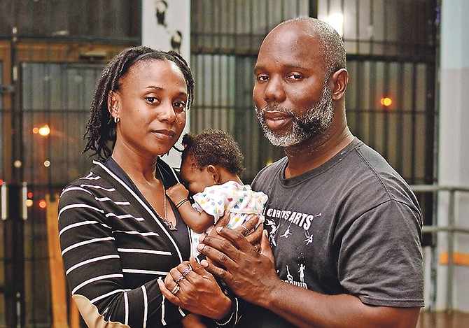 DEREKA and Jarvis Grant with Ja’Dei. Photo: Shawn Hanna/Tribune Staff