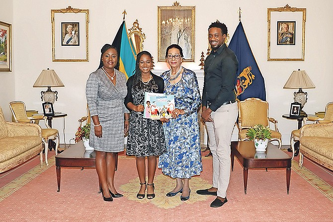 Teen author Sierra Blair (second from left) and illustrator Lamaro Smith (far right) meet with Governor General Dame Marguerite Pindling.