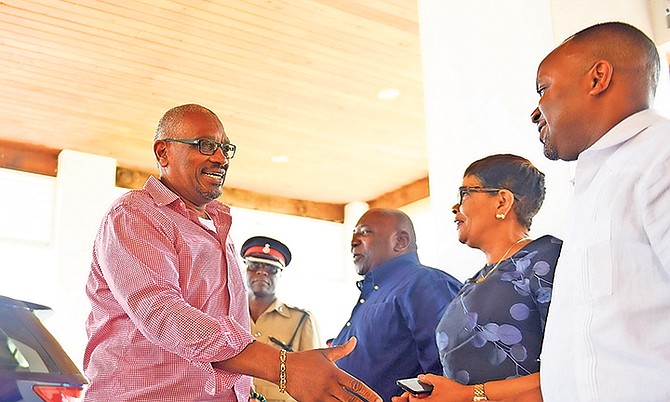 HUBERT Minnis shakes hands with Kwasi Thompson, Minister of State for Grand Bahama. Well meaning people who say the right things but that does not convert into action on the ground.