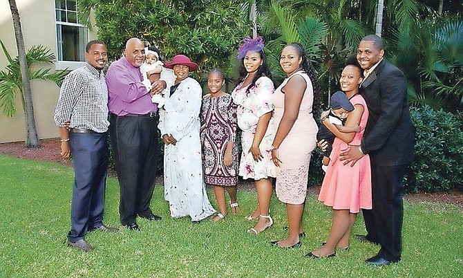 The Cooper family including, far right, Frahkan and his wife Dr Tina Adderley.