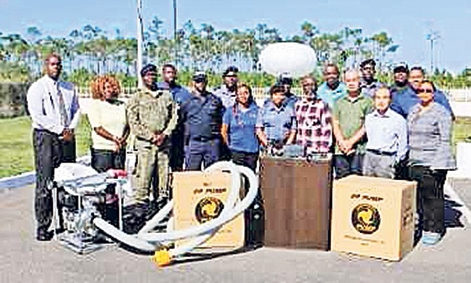 Following donation of equipment by the Japanese government to aid the Bahamas’ disaster management programme, training sessions on use of the equipment were held December 17-20 at NEMA on Gladstone Road. Pictured far left is Director of NEMA Captain Stephen Russell along with Japanese training instructors and participants. Photo: Patrick Hanna/BIS