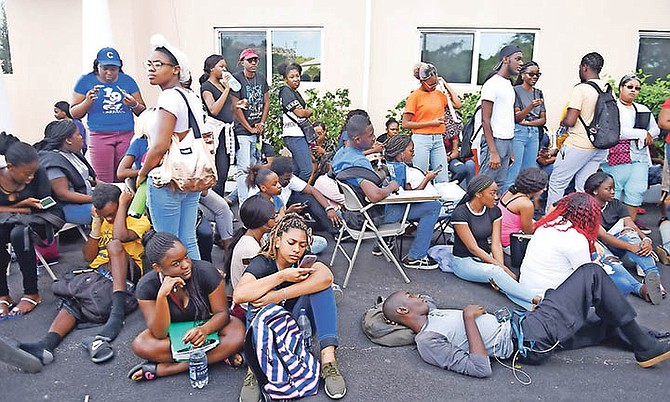 Students are forced to sit and wait at the University of The Bahamas during the registration chaos. Photo: Shawn Hanna/Tribune Staff