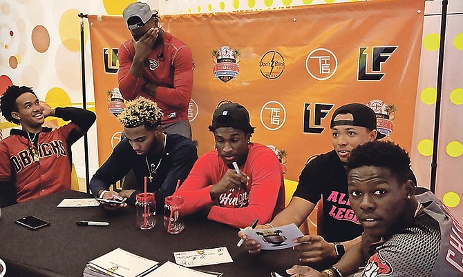 SEATED (l-r) are DJ Collie, Trent Deveaux, Lucius Fox Jr, Todd Isaacs Jr and Jazz Chisholm. Several of the participants in this weekend’s Don’t Blink Home Run Derby in Paradise hosted a Pop Up Meet and Greet at the REV Cable Bahamas office in the Marathon Mall.
