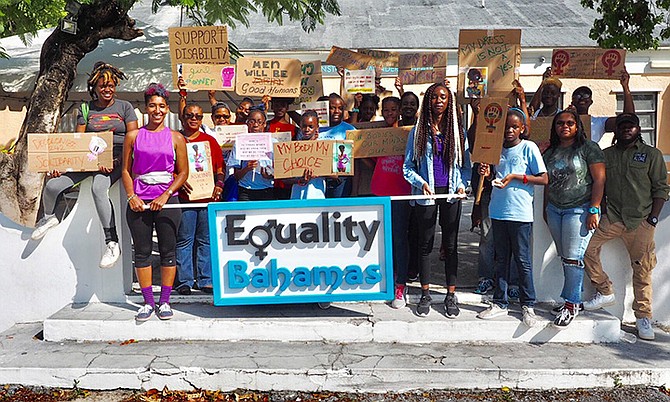 Members of the Equality Bahamas organisation stand together proudly to advocate for women.