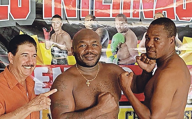 FIGHT NIGHT: Sherman “Tank” Williams (centre), of the Bahamas, is all set to square off with Samuel Miller in a 10-round co-main event tonight at the Miguel Lora Coliseum in Monteria, Colombia.