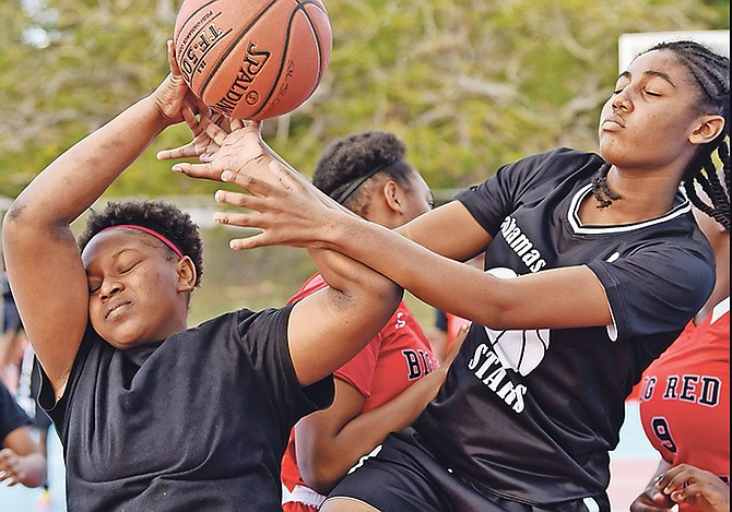 WITH OUR EYES CLOSED: The Bahamas Academy Stars junior girls suffered a lopsided 59-3 loss to the undefeated defending champions St Augustine’s College Big Red Machine in Bahamas Association of Independent Secondary Schools basketball action yesterday.

Photo: Shawn Hanna/Tribune staff