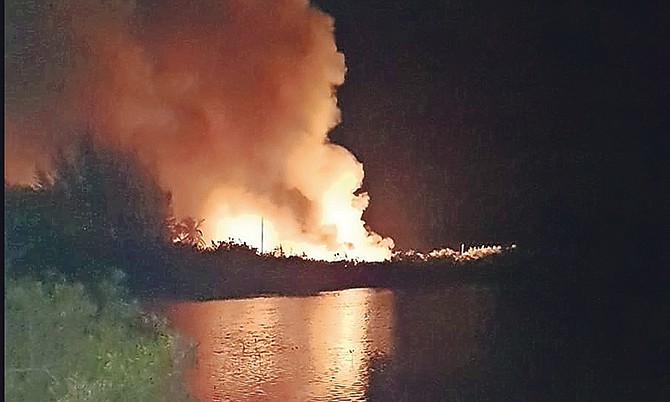 Fires burning at Princess Cays on Monday night.