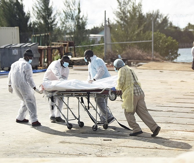 Recovery efforts on Sunday. Photo: Shawn Hanna/Tribune staff