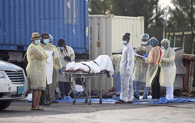 A body brought ashore in the recovery effort. Photo: Shawn Hanna/Tribune staff