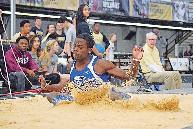 Ken Mullings in action in the long jump as he soared to a new national record in the heptathlon. Photo: UB Bahamas