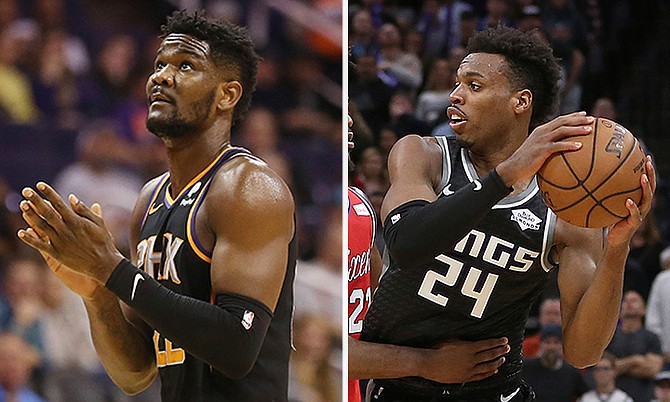 Deandre Ayton and Buddy Hield in action during their games at the weekend. (AP)