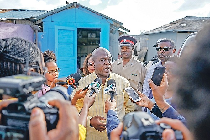 Chief Superintendent Solomon Cash speaks to the media at the scene.