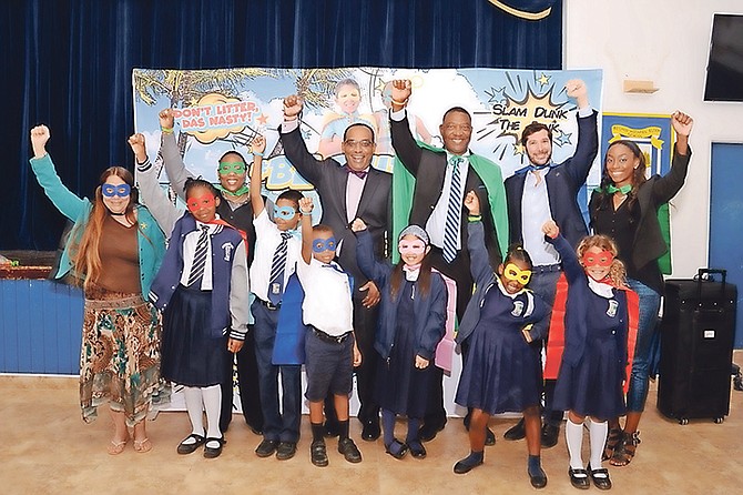 Students of Bishop Michael Eldon School give the signature #BeAHero pose with Minister Ferreira after sharing their ideas to contribute to the campaign.