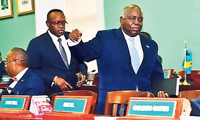 PLP leader Philip Davis leads the way as PLP members leave the House of Assembly. Photo: Yontalay Bowe/BIS