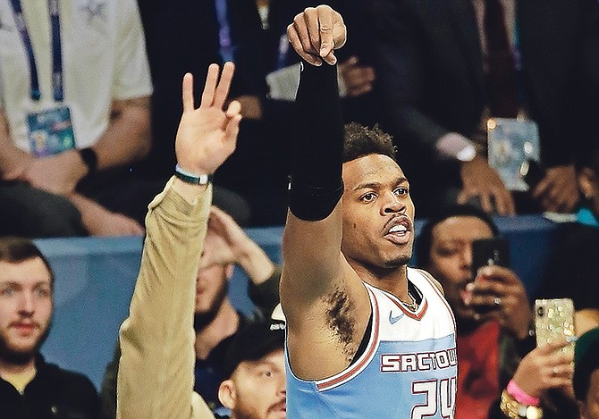 Sacramento Kings' Buddy Hield reacts to making his 26th basket during the NBA All-Star 3-Point contest on Saturday.

(AP Photo/Gerry Broome)