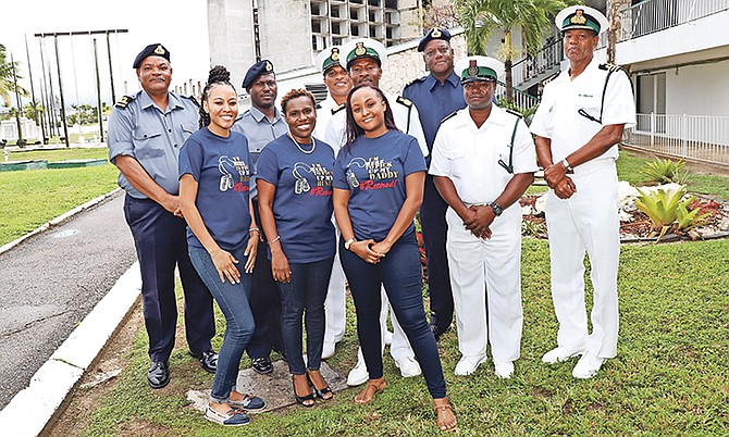 CPO Brian Miller along with his wife and children, Officers and Warrant Officer of the Engineering Department.