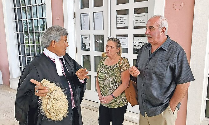 Attorney Fred Smith, QC, with Sandra Georgiou and Bruno Rufa.