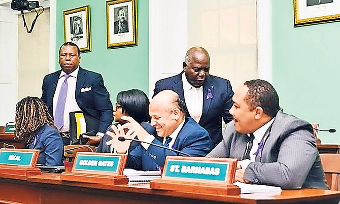 PLP leader Philip Davis and South Andros MP Picewell Forbes depart the House of Assembly. Photo: Yontalay Bowe