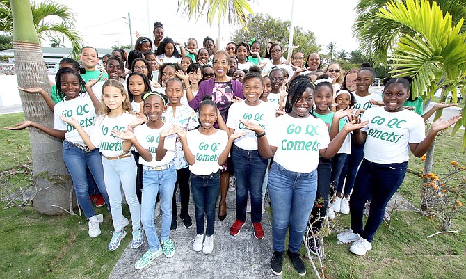 Patricia Minnis, wife of the prime minister, is pictured with the grade 6 girls who dedicated a song to her entitled 'Something Inside So Strong'. (BIS Photo/Derek Smith)