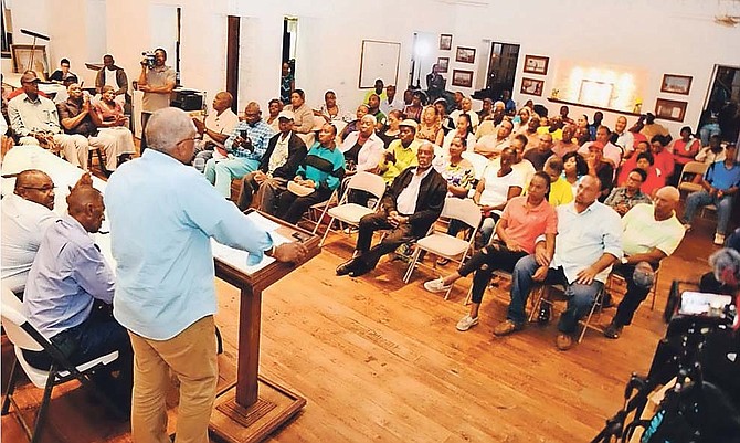 Prime Minister Hubert Minnis addresses a town hall meeting in Eleuthera on Saturday.