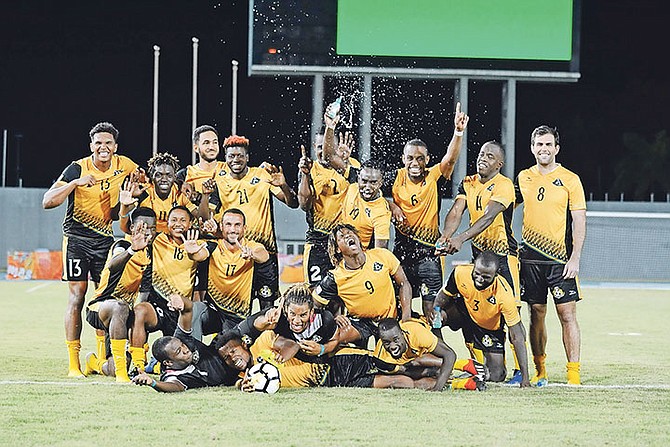 Team Bahamas celebrates after their victory on Saturday. Photo: Shawn Hanna/Tribune staff