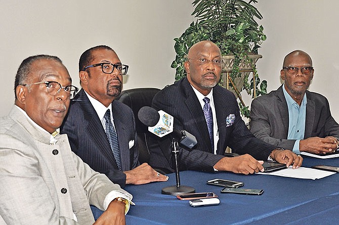 From left: Attorney Carlson Shurland, Kenneth Symonette, Elvis Burrows and Paxton Cooper.               Photo: Vandyke Hepburn