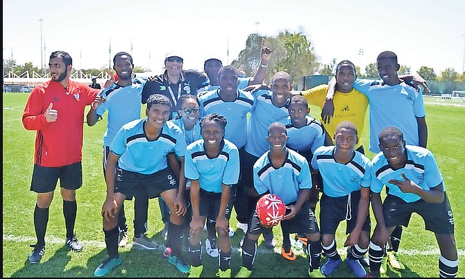 Team Bahamas’ 7-a-side soccer team celebrate winning the bronze at the Special Olympics World Summer Games in Abu Dhabi.