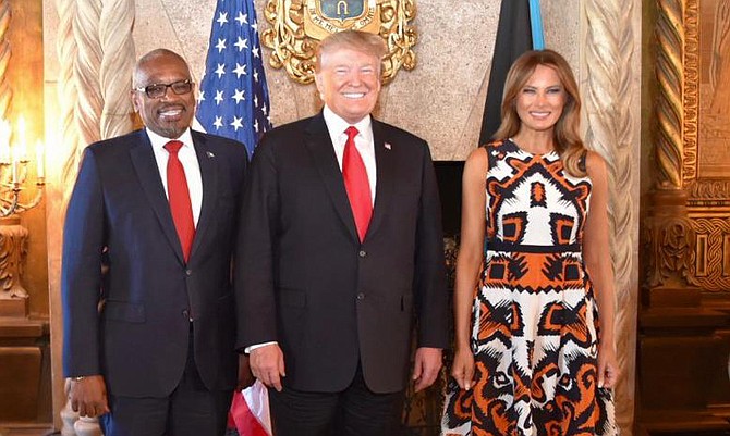 Prime Minister Dr Hubert Minnis with US President Donald Trump and First Lady Melania Trump. Photo: Yontalay Bowe