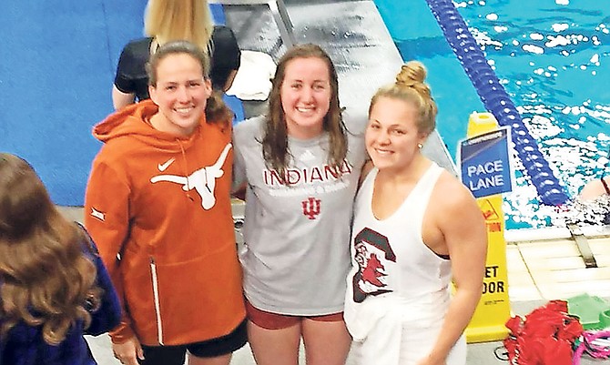 Shown (l-r) are swimmers Joanna Evans, Laura Morely and Albury Higgs.