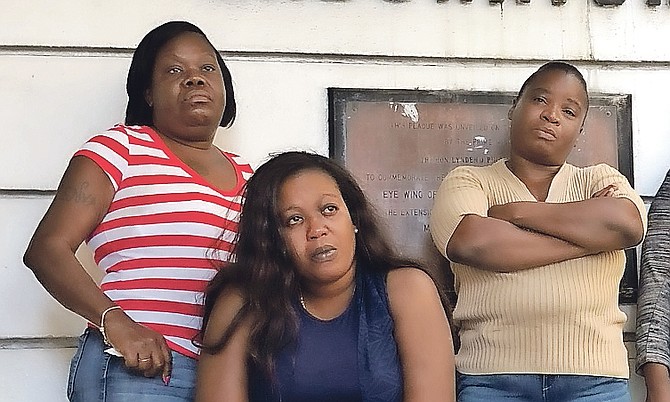 Perry Rolle's mother Gladys Louise (centre). Photo: Shawn Hanna/Tribune staff