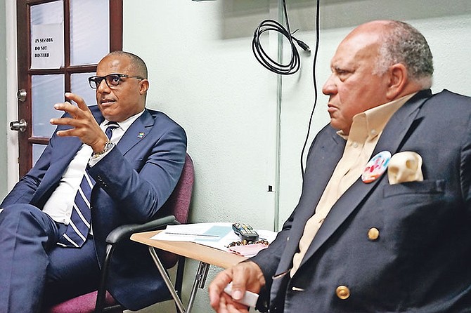 Minister of National Security Marvin Dames and Dr David Allen at the Ministry of National Security Advisory Council on Crime. Photo: Terrel W. Carey Sr/Tribune Staff