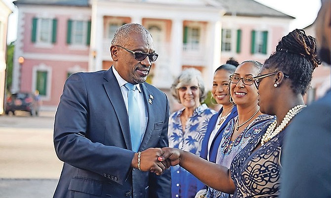 Prime Minister Dr Hubert Minnis is pictured arriving at REACH's 7th annual Light It Up Blue Ceremony at Rawson Square on Tuesday evening. Photo: Shawn Hanna/Tribune staff