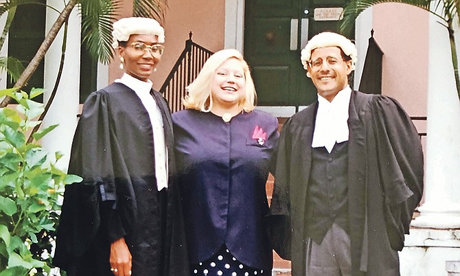 TAMARA MERSON, centre, with her lawyers Fred Smith and Pleasant Bridgewater. Ms Merson was awarded $280,000 damages in 1987 for false imprisonment and the abuse she suffered at the hands of Bahamian police officers. Thirty years later the same issues continue to haunt the Bahamas police.