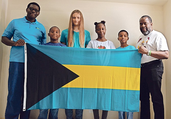 Members of the 2019 Bahamas CARIFTA chess team along with their team coach and corporate sponsor of the team. From left, Elton Joseph, president, Bahamas Chess Federation; Daniel Ramtulla; Aidan Mart; Trinity Pinder; Noah Albury; and Dr Charles W Diggiss, president and owner, the MedNet Group of Companies. Team members not pictured: Marfeeyou Joseph and Aaron Ramtulla.