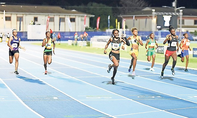 Anthaya Charlton winning the under-17 girls' 100m.