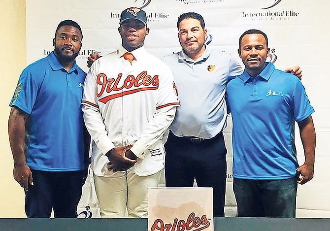 BIG DEAL: Shown (l-r) are Albert Cartwright, James Rolle, Calvin Maduro, of the the Orioles, and Geron Sands.
