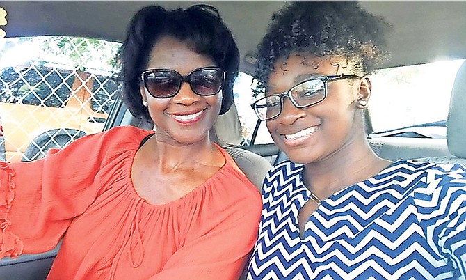 Dominique (right) with her mother, Tami Gibson, who was killed in last year’s Labour Day tragedy.