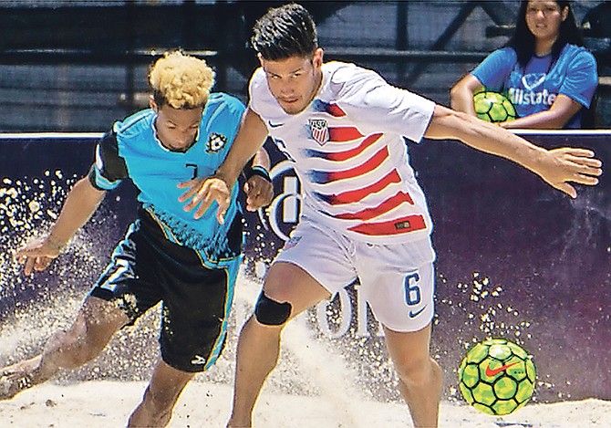 Team Bahamas' Timothy Munnings (left) in action during the game against the US.