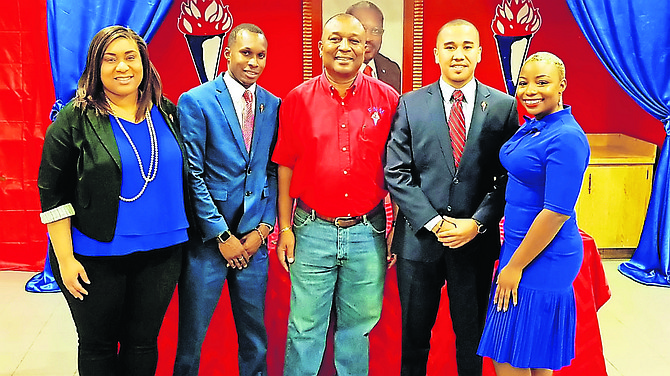 TYA members alongside FNM chairman Carl Culmer, centre, with TYA president Carlyle Bethel, second right and TYA chairwoman Denielle Miller, right.