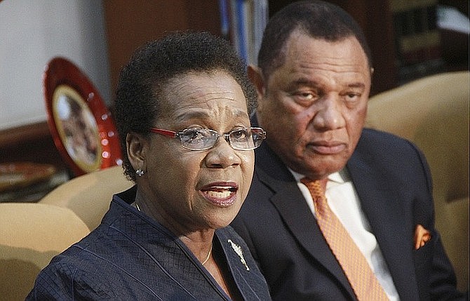 Retired Justice Rubie Nottage with former Prime Minister Perry Christie