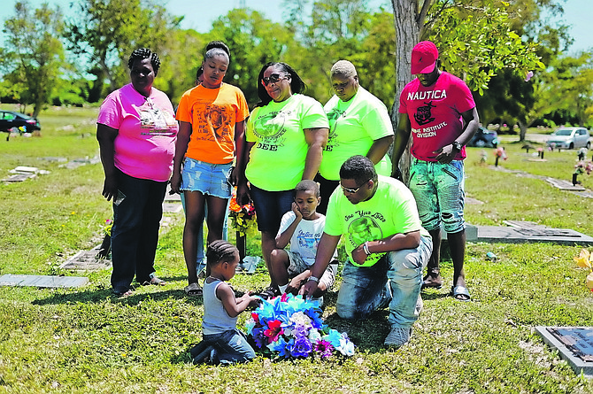 The family of Deangelo Evans remember the anniversary of his death yesterday.
 Photos: Terrel W Carey Sr/Tribune Staff
