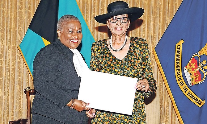 Ruth Bowe-Darville is sworn in as Justice of the Supreme Court by Dame Marguerite Pindling. Photo: Letisha Henderson/BIS