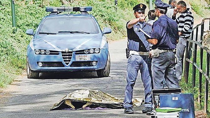 Officers at the scene in Italy after a Bahamian diplomat’s body was found in a river.