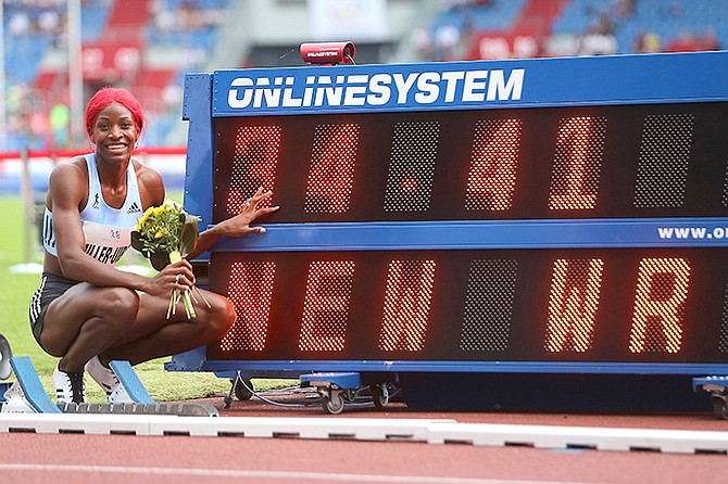 Shaunae Miller-Uibo celebrates after she won the women's 300 metres event in a new world record, at the Golden Spike athletics IAAF World Challenge in Ostrava, Czech Republic, Thursday. (Jaroslav Ozana/CTK via AP)