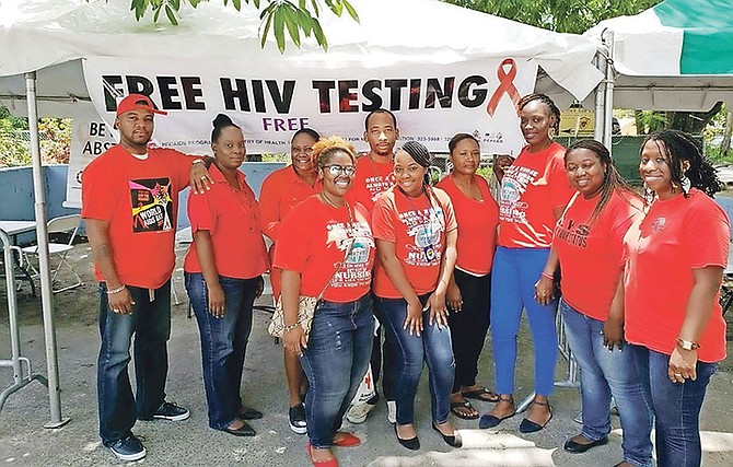 Volunteers from the Ministry of Health offer free HIV/AIDS testing at the 2018 National Testing Day event. The confidential process is part of efforts to encourage more persons to get tested and know their status.
(Photo courtesy of HIV/AIDS Center MOH-BAH)